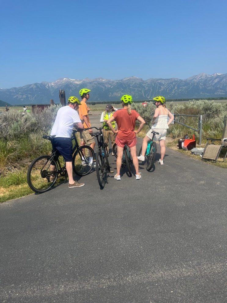 A field researcher intercepts cyclists on the Grand Teton multi-use pathway